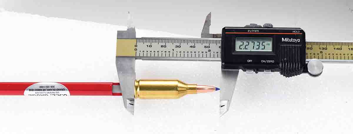 The gauge has a cutout in the push rod sleeve at the base of the case to accept the jaw of a caliper for measuring.